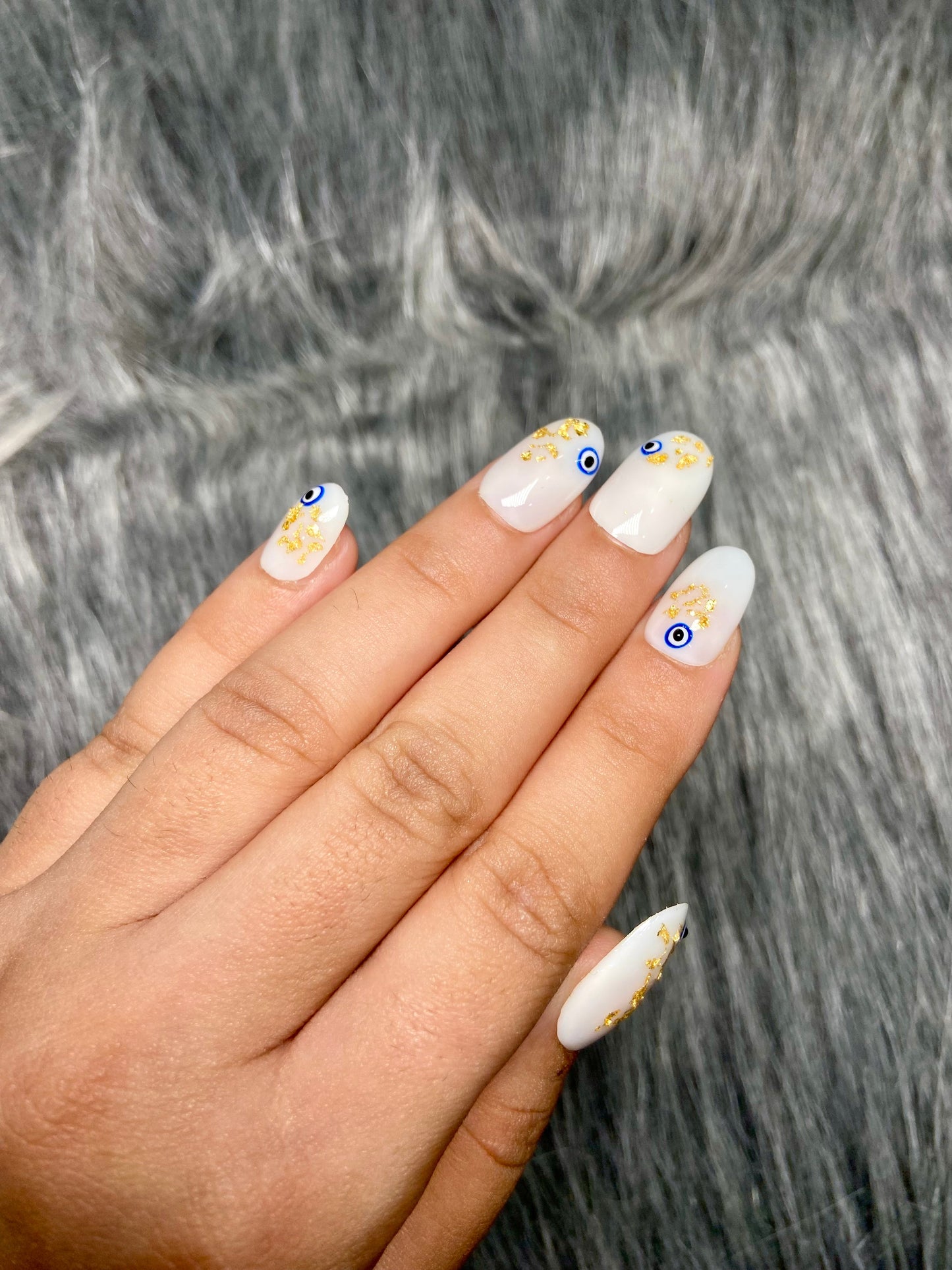 pearl white evil eye nails