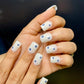 floral evil eye nails