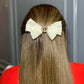 White Broach Bow