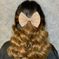 Peach glitter bow