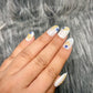 pearl white evil eye nails
