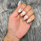 pearl white evil eye nails