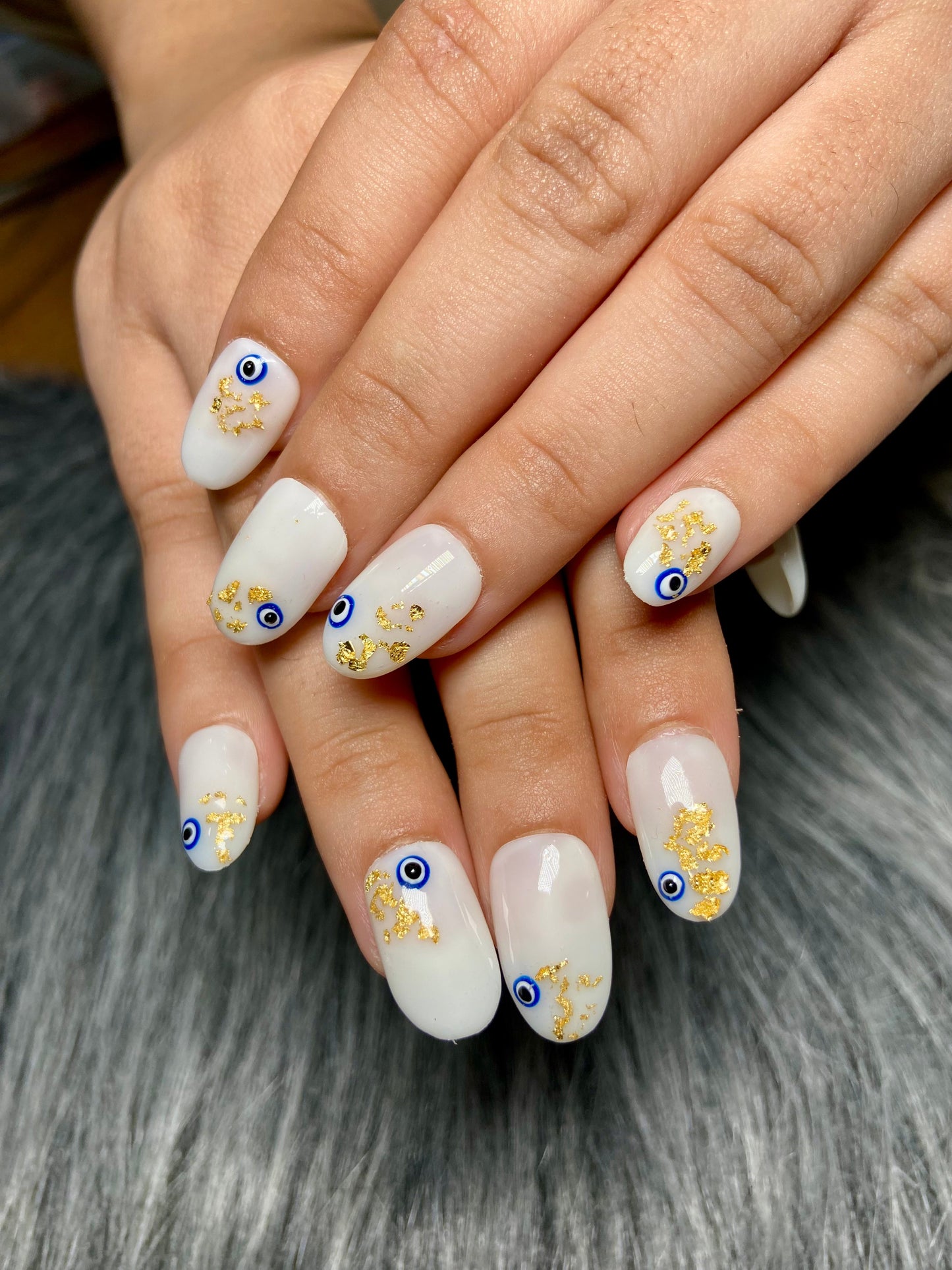 pearl white evil eye nails