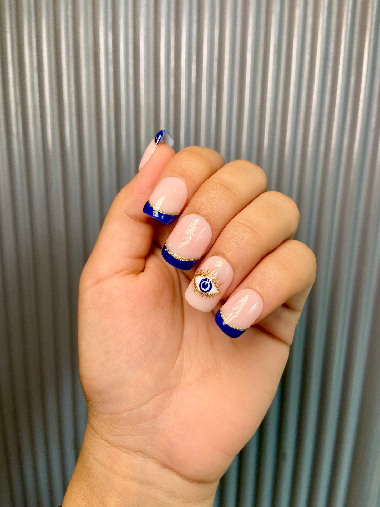 French blue evil eye nails