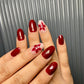 Mehroon floral nails