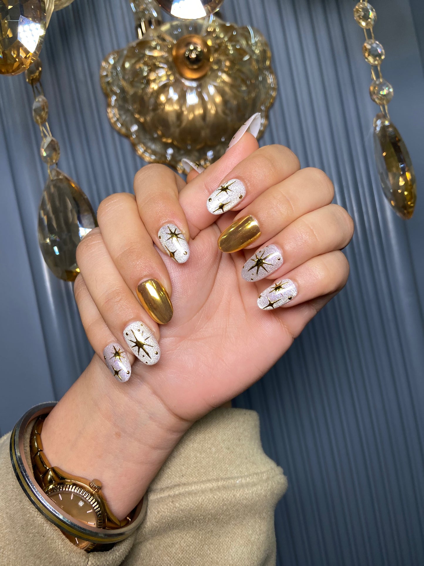 Gold star cat eye nails