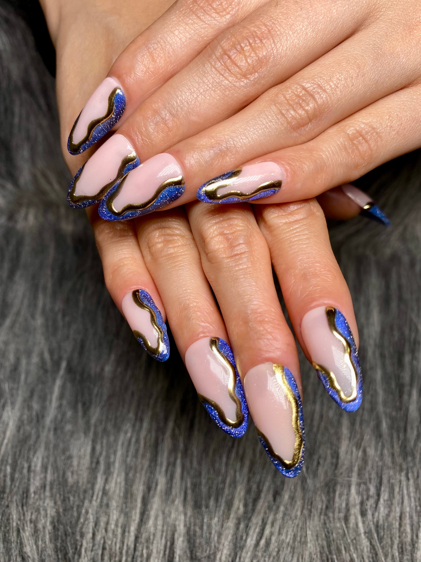 Blue chrome cat eye nails