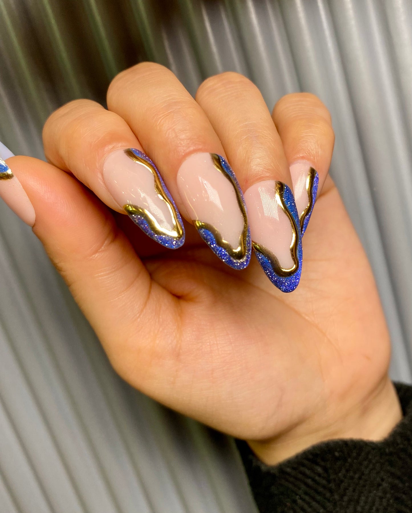 Blue chrome cat eye nails